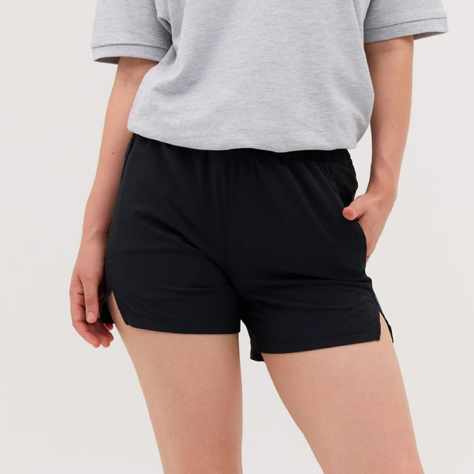 Black running shorts with side slits, featuring an elastic waistband and pockets. The model is wearing a grey top.