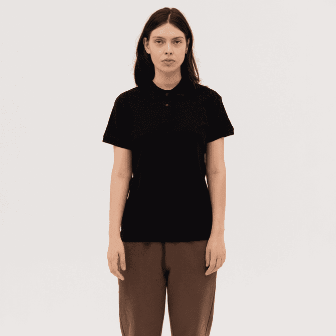 A black women's polo shirt with a collar, featuring short sleeves and a simple design. It includes a logo.