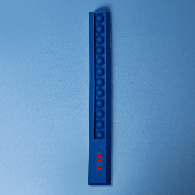 A blue popper ruler with multiple poppable buttons and a branded logo on one side.
