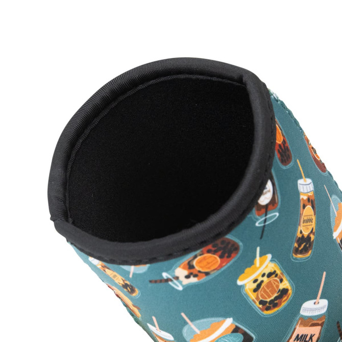 A neoprene cup sleeve in teal featuring various drink illustrations, with a black trim and an inner opening.