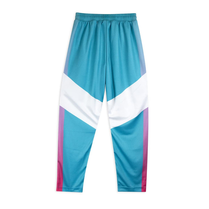 Active pants in teal with white and purple gradient accents. Features an elastic waistband and has a logo.