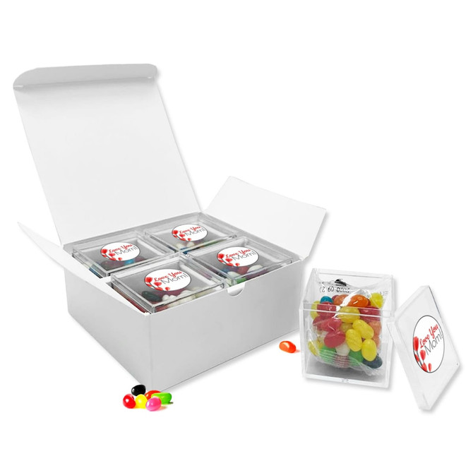 A gift pack containing four transparent containers of colourful jelly beans, displayed in a white box.