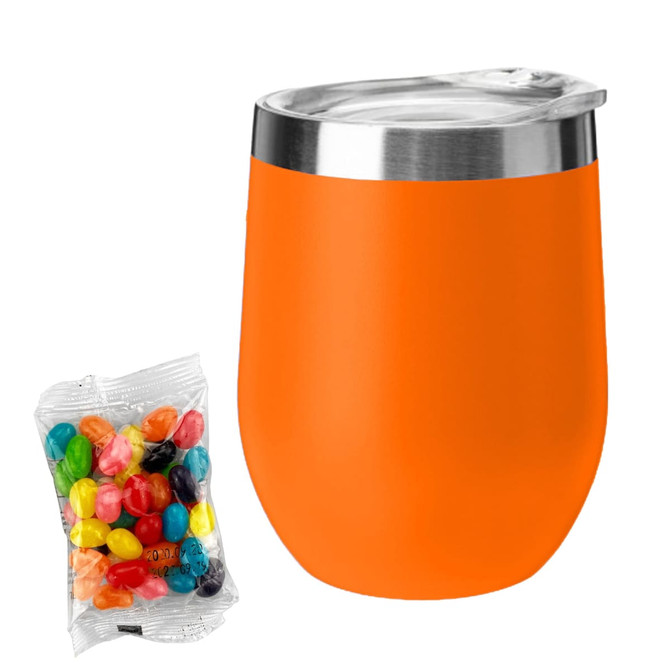 An orange coffee cup with a stainless steel lid alongside a pack of colourful jelly beans.