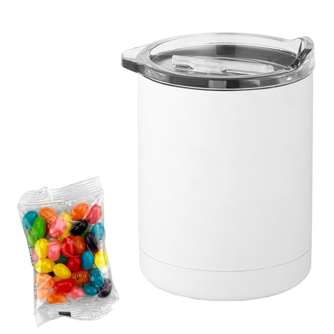 A white coffee mug with a transparent lid alongside a packet of colourful jelly beans.