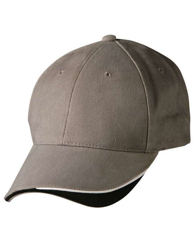 A khaki cap with a curved peak, featuring a simple design and an interior black lining. It has a logo on the front.