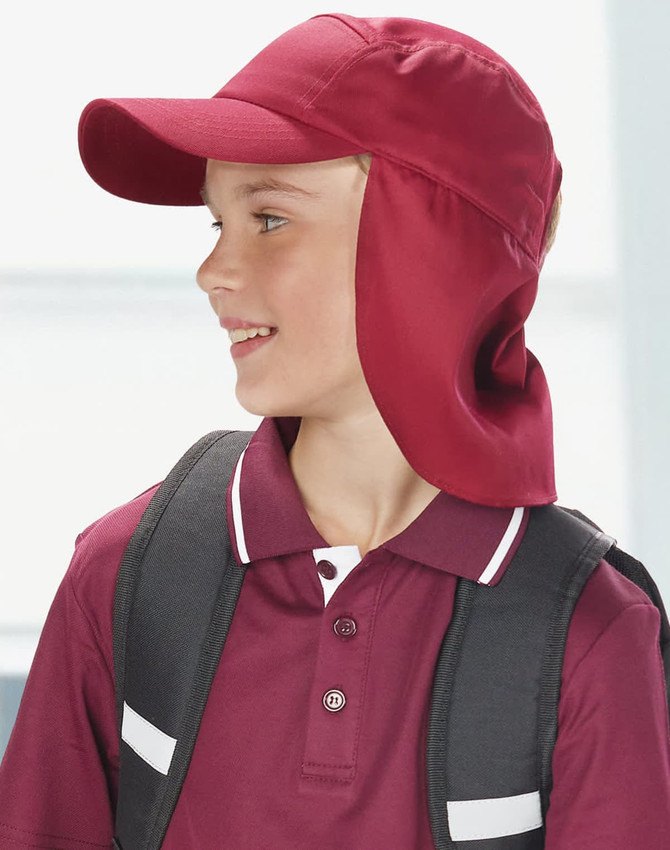 A maroon poly cotton legionnaire hat with a wide brim and flap, worn by a smiling child with a backpack.