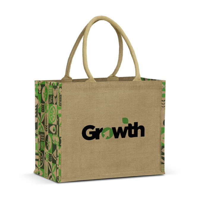 A jute tote bag with green and natural hues, featuring a logo and patterned sides.
