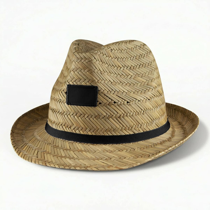 A Panama straw hat in a natural tan colour with a black band and a patch on the side.