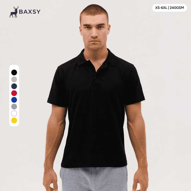 A black polo shirt on a model, featuring a logo and available in multiple colours.
