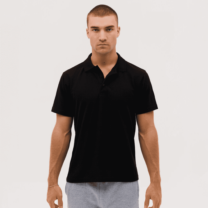 A black polo shirt with a classic collar and short sleeves. The shirt features a logo on the chest.