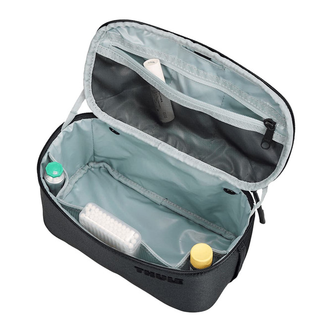 A grey toiletry bag with a removable pouch, featuring multiple compartments and a splash-proof interior.