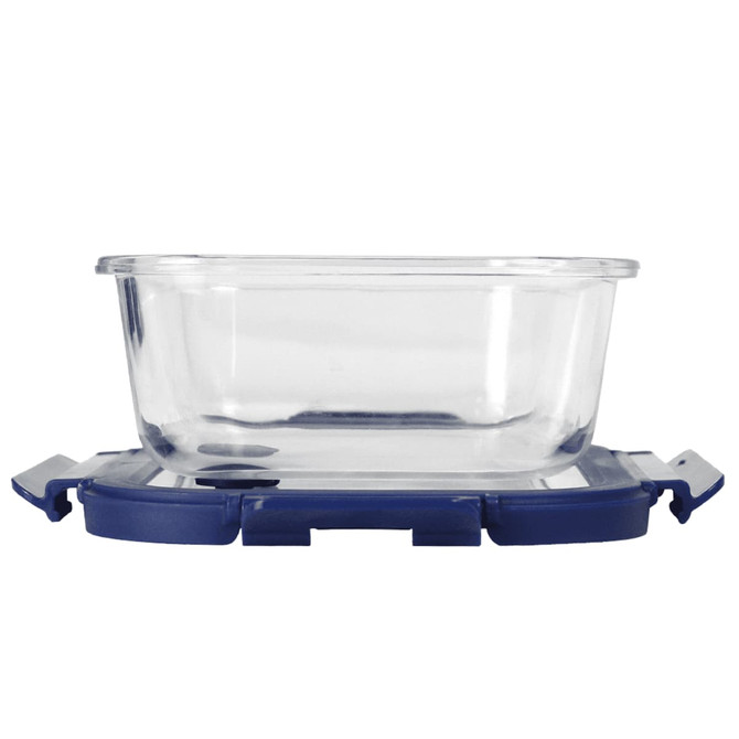 A clear glass lunch box with a navy blue lid and a secure locking mechanism.