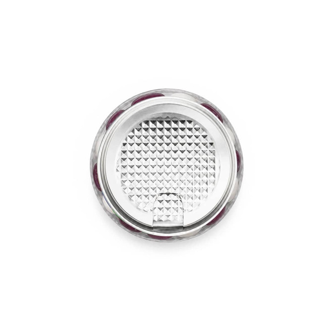 A clear can filled with colourful jelly beans, showcasing a mix of vibrant hues, with a textured silver lid.