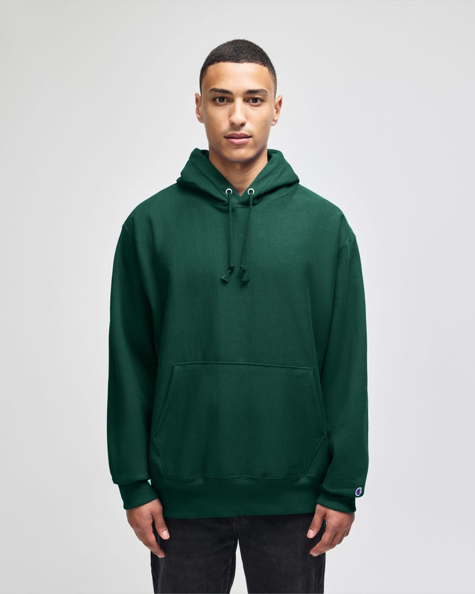 An olive green pullover hooded sweatshirt with a front pocket and a logo on the sleeve.