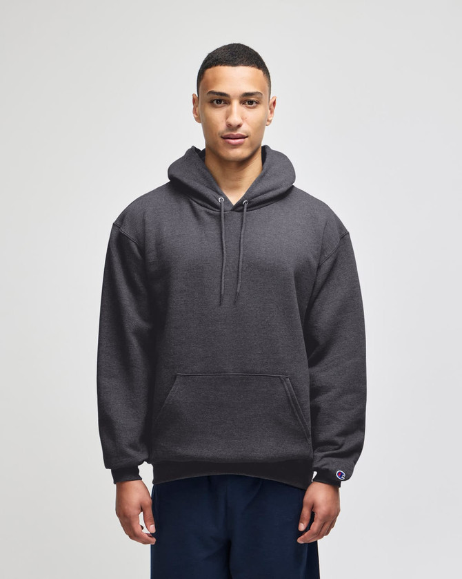 A dark grey crewneck sweatshirt is displayed on a model, featuring a hood and a front pocket. It has a logo.