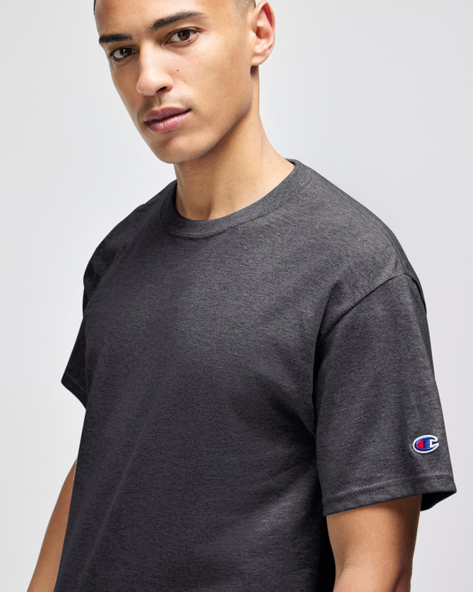 A dark grey short-sleeve t-shirt featuring a logo on the sleeve, designed for adults.