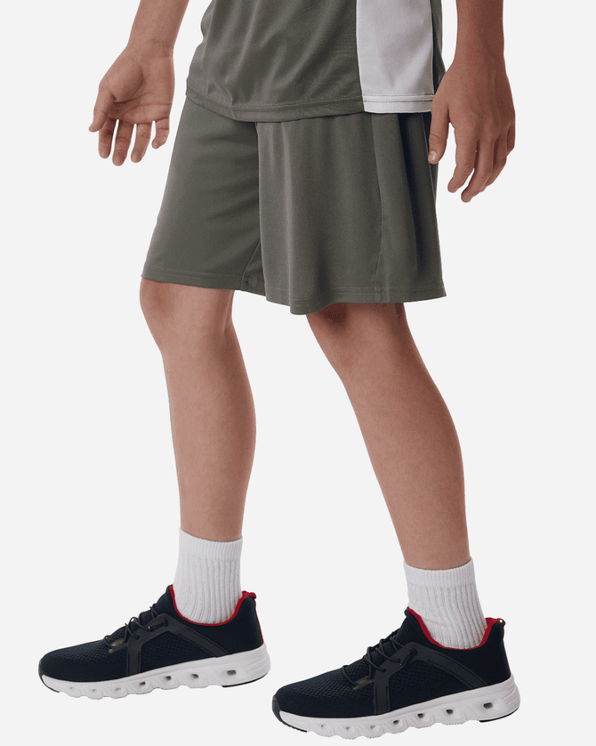 Men's Pro-Lock Performance Short in olive green, featured alongside black athletic shoes with red accents.