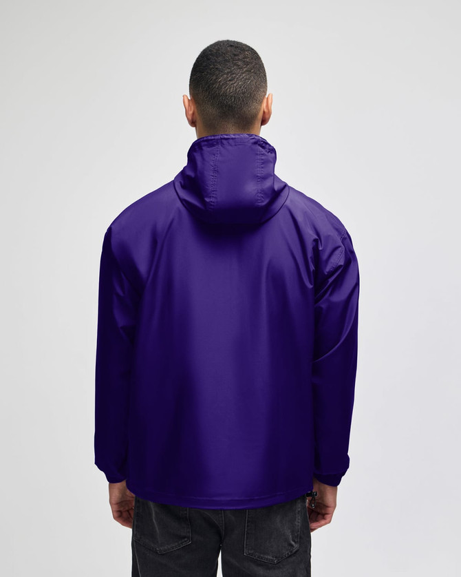 A packable anorak jacket in a vibrant purple colour, featuring a hood and a branding logo on the back.