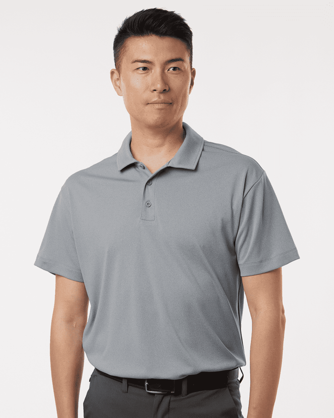 A grey men's polo shirt with a collar and short sleeves, featuring a logo on the chest area.