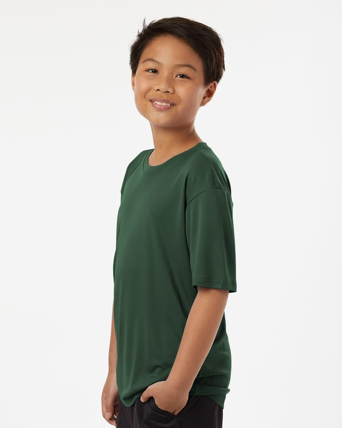 A youth performance t-shirt in deep green, featuring short sleeves and a relaxed fit. It has a logo on the shirt.