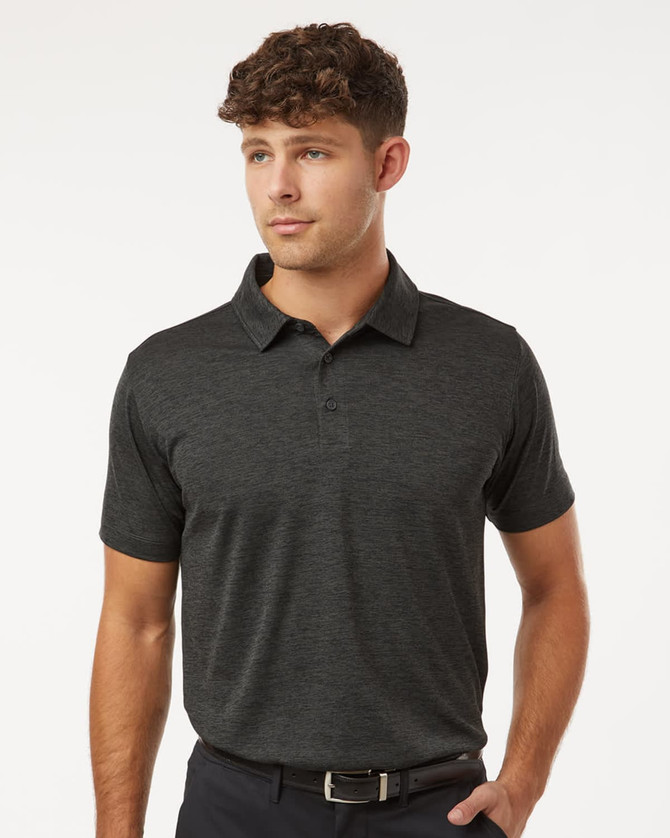 A men's polo shirt in dark heather grey with a collar and short sleeves. It features a logo on the chest.
