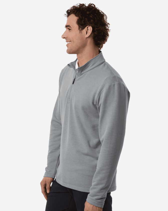 A grey men's stretch fleece 1/4 zip pullover is displayed on a model, featuring a logo.