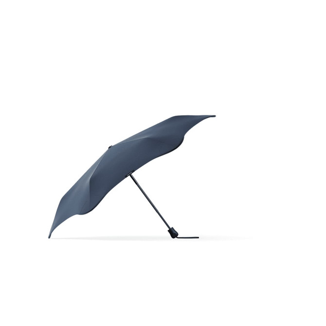 A navy BLUNT Neo Umbrella with a sleek design, featuring a curved canopy and a black handle.
