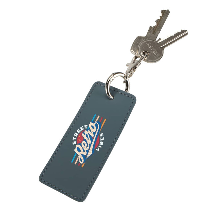 A blue rectangle keychain with a branding logo, holding several keys attached to a metal keyring.