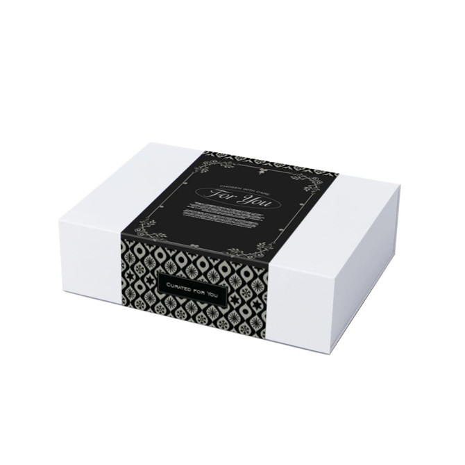A gift box featuring a black and white patterned design, wrapped with a decorative band.