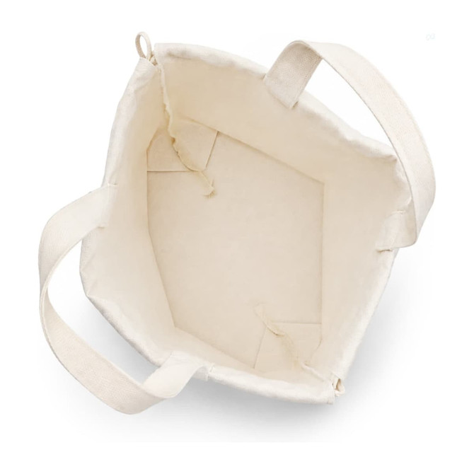 A cream-coloured tote bag with sturdy handles, featuring an open interior and a square base.