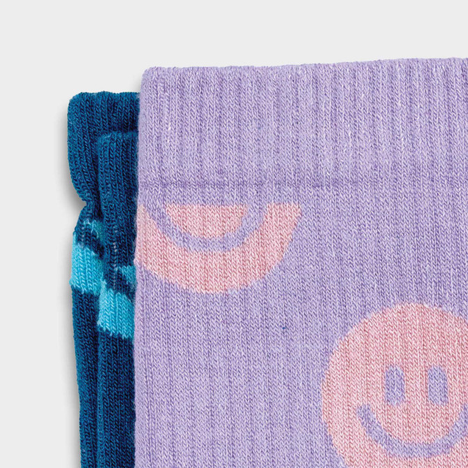 A set of two pixel knitted bamboo crew socks, featuring purple and teal colour patterns with smiley faces.