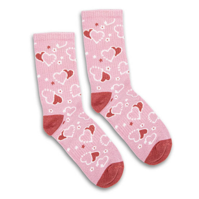 A pair of pink kids' socks featuring heart patterns in red and white, with a solid pink cuff and toe.