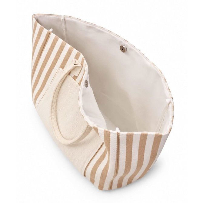 A tan and cream striped tote bag with an inner lining and two handles. It has a snap closure.