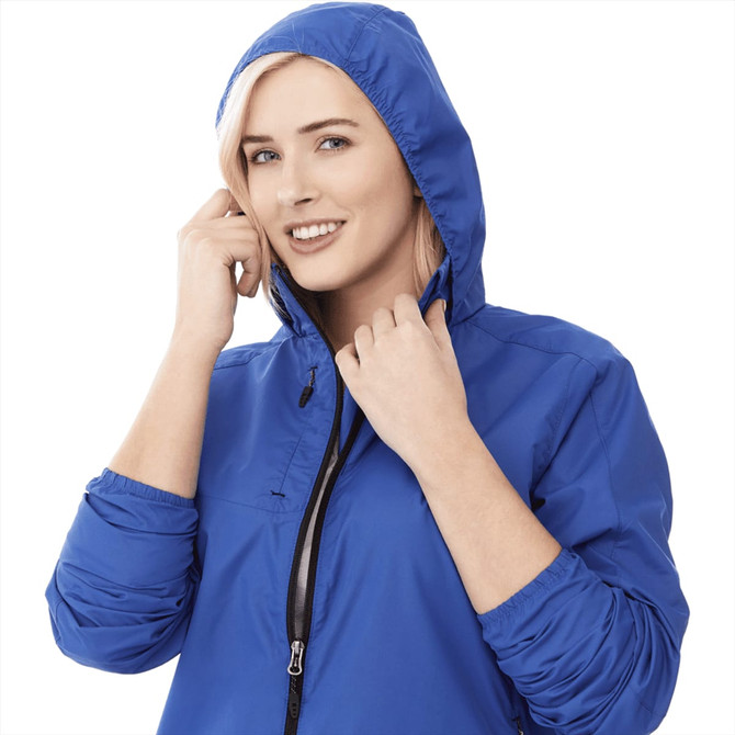 A lightweight women's jacket in bright blue, featuring a hood and zippered front. It has a logo on the chest.