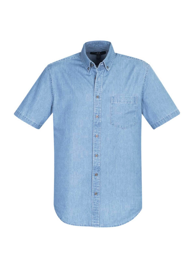 A short sleeve button-up shirt in light blue denim with a pocket and a logo on the chest.
