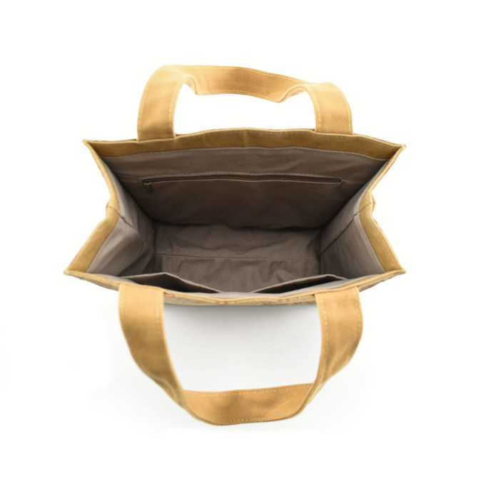 A tan Kraft paper tote bag with a spacious interior and a zippered pocket. It has two sturdy handles and a simple design.
