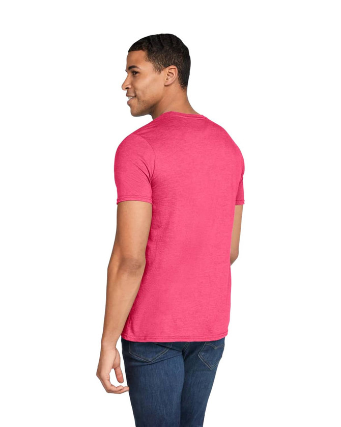 A man wearing a pink adult tri-blend tee, standing with his back to the camera, features a logo on the shirt.