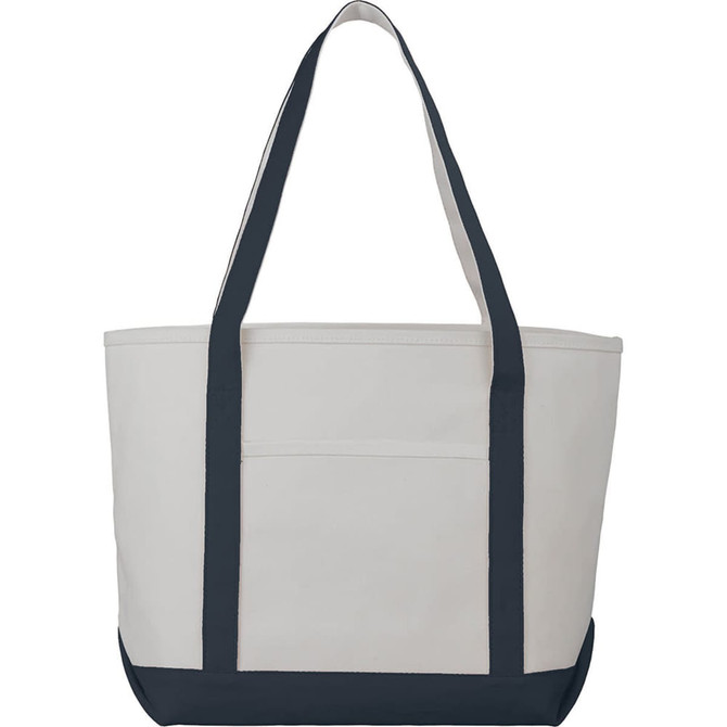 A heavy-weight cotton tote bag in cream with navy blue straps and base, featuring a large main compartment and one external pocket.