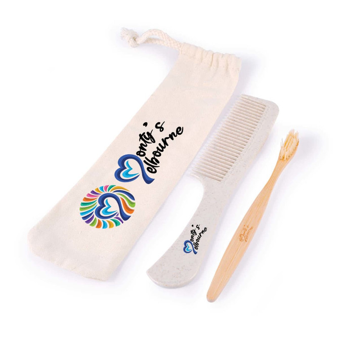 A toiletry pack containing a bamboo toothbrush, a comb, and a cotton pouch featuring a colorful heart graphic.