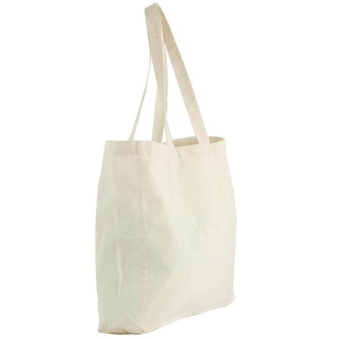 A natural cotton shopper tote in a cream colour, featuring two handles and a simple design.