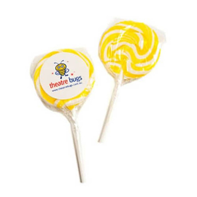 Two yellow medium candy lollipops with swirled designs, individually wrapped with a logo on one.
