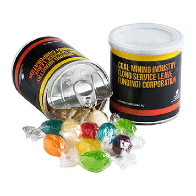 A cylindrical container with a lid, filled with colourful boiled lollies spilling out. The container features a logo.
