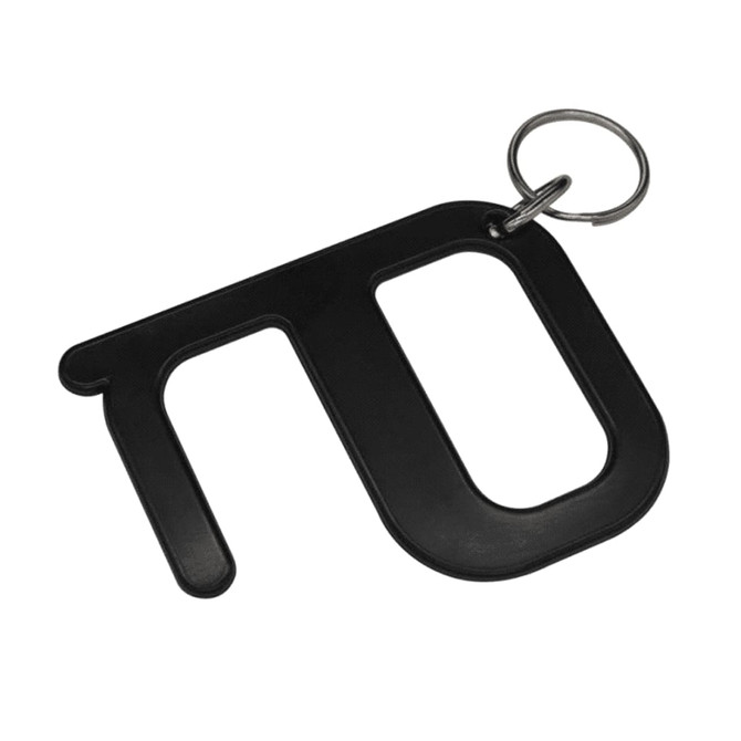 A black hygiene key with a keyring attachment, designed for contactless use. It has a simple, modern shape.