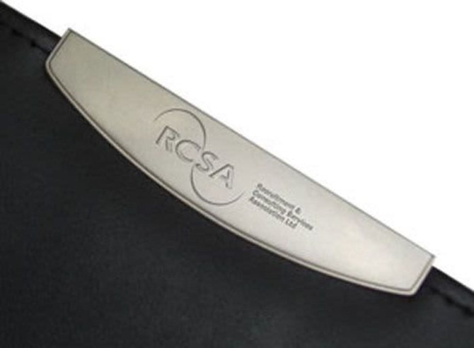 A black compendium featuring a silver metal clip with a logo, designed for office and business use.