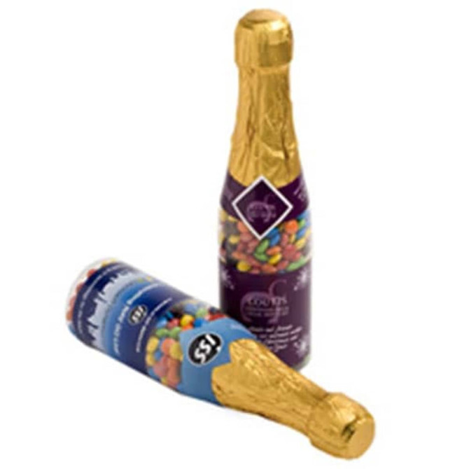 A drink bottle styled like a champagne bottle, filled with colourful Mini M&Ms and wrapped in gold foil.