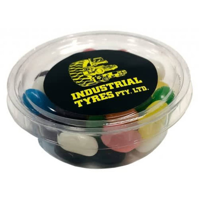A tub filled with assorted jelly beans in various colours, featuring a branded black lid.