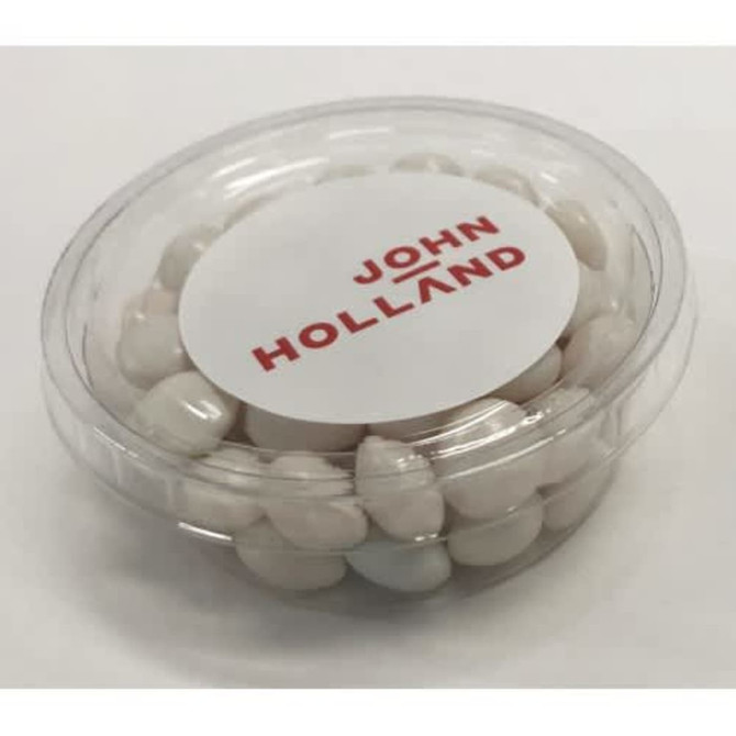 A clear tub filled with white mints, featuring a logo on the lid.