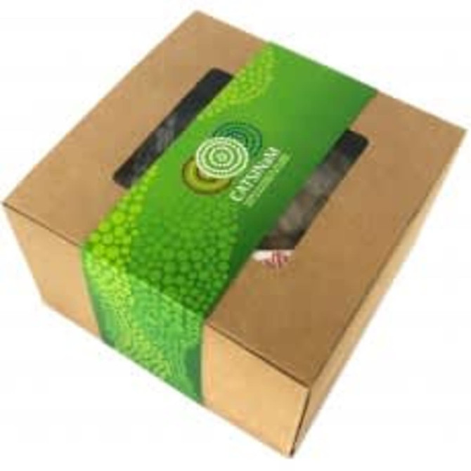 A kraft gift box with a green sleeve, containing miscellaneous confectionery items.