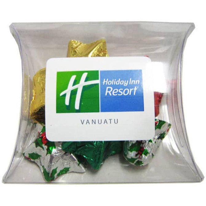 A pillow pack filled with colourful Christmas chocolates in gold, green, red, and silver foil. Includes a logo on the pack.