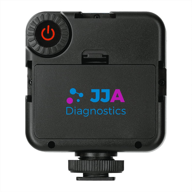 A portable video light in black with a power button and a branded logo on the front.